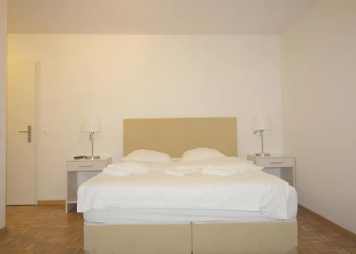 Апартаменты Swiss Star District 11 - Self Check-in *